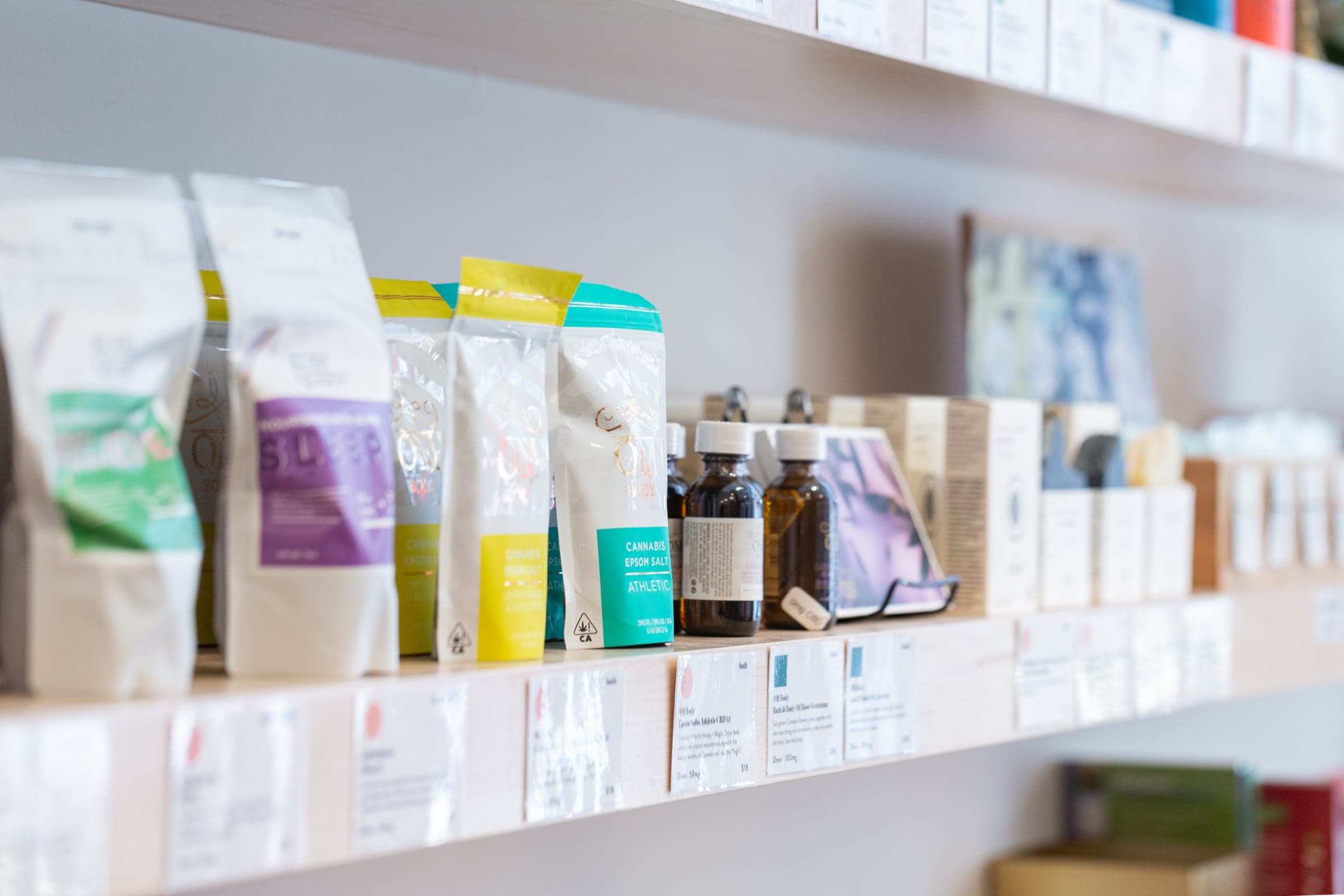 A wide array of cannabis tinctures and edibles on a shelf